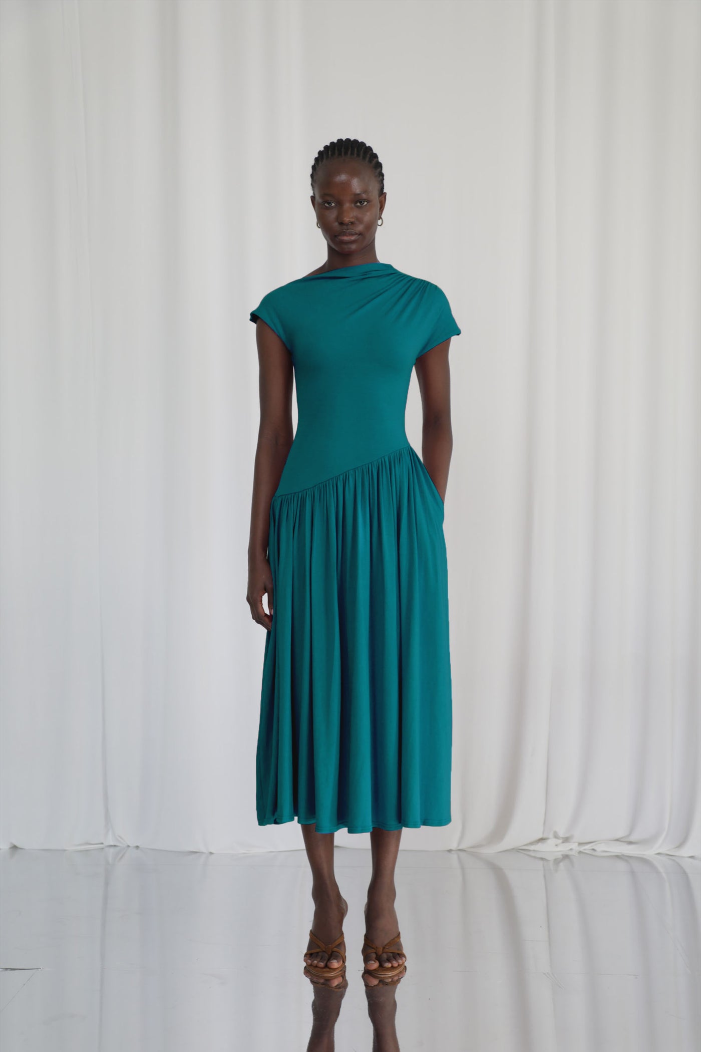 Lily Asymmetric Dropped Waist Maxi Dress in pine green, model height 5'9" wears UK 6-8 (US 2-4)