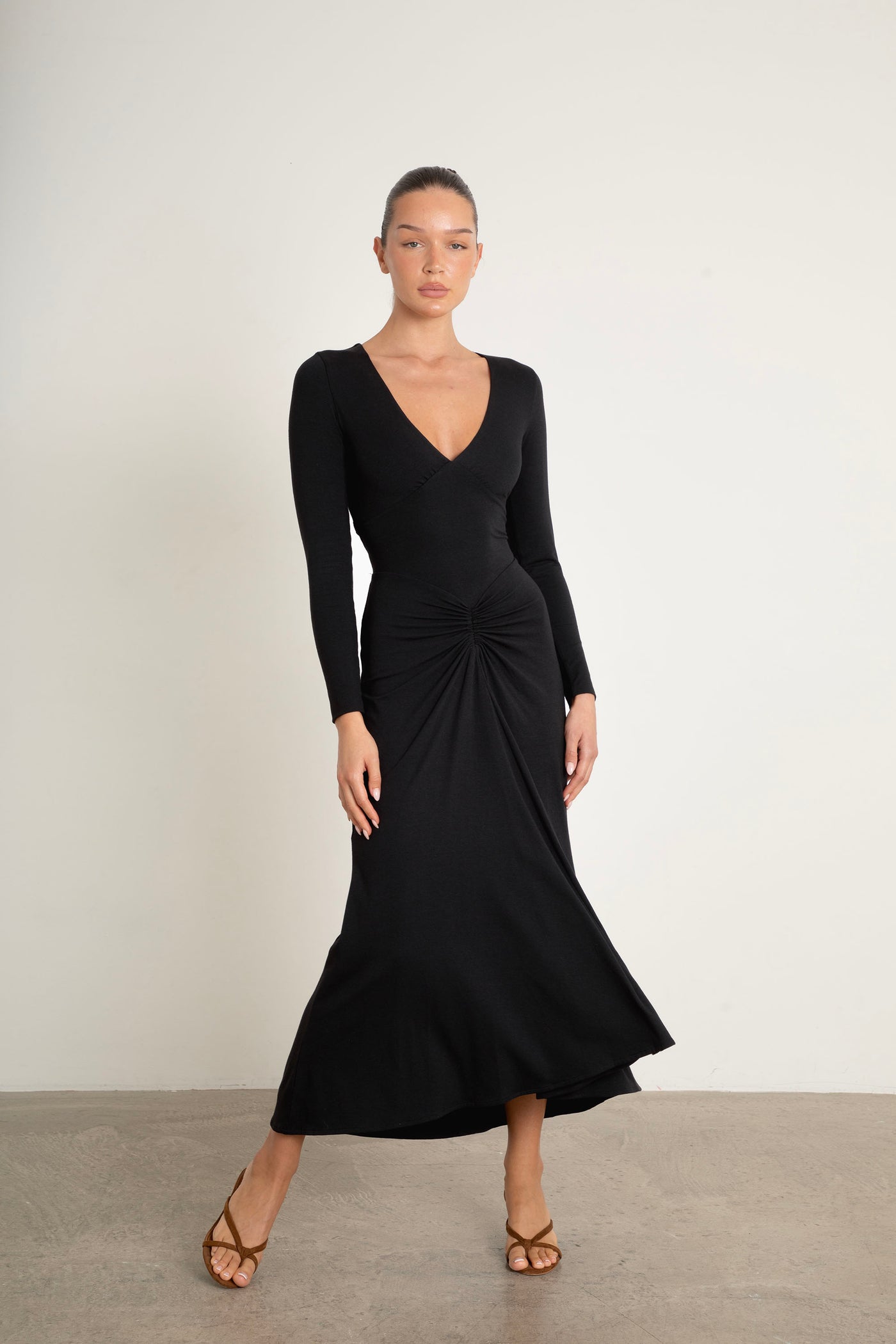Honey Dress black long sleeve midi dress with plunge neck, corset waist, fishtail skirt